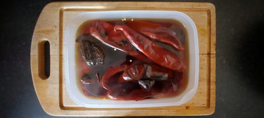 Guajllo and Ancho Chillies in boiling water
